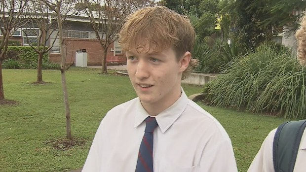 Gold Coast bus crash - teenage students steer it to safety after driver had heart attack