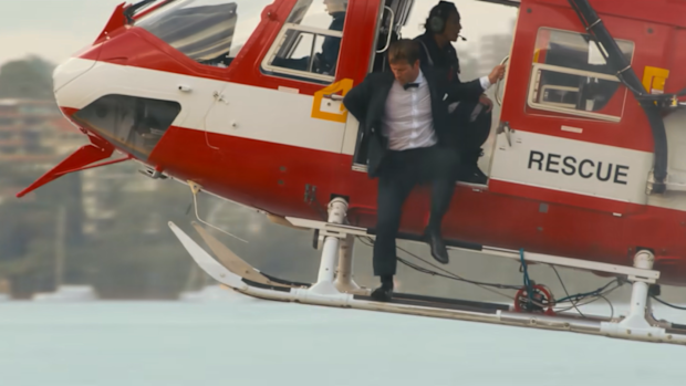 In a scene at the end of the movie, Glen Powell's character flies into the Opera House forecourt on a Surf Lifesaving helicopter, chasing down the love of his life, Sydney Sweeney's character.