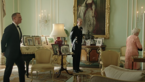 A screenshot of Daniel Craig as James Bond, Paul Whybrew, and the Queen from a skit for the 2012 London Olympics.