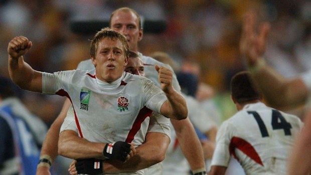 England's match winning hero Jonny Wilkinson is hugged by Ben Cohen on the final whistle.