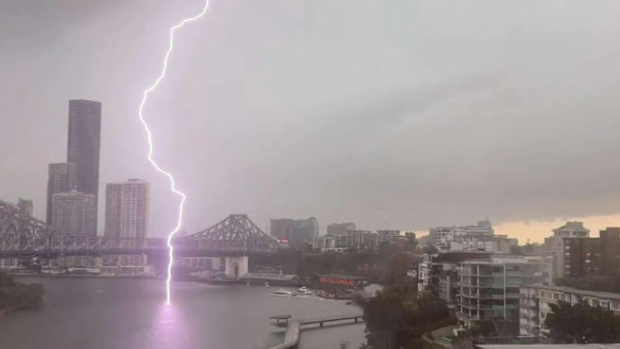 A massive supercell thunderstorm has hammered parts of Queensland, unleashing giant hail, fierce winds and lightning