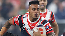Spencer Leniu in action for the Sydney Roosters against the Broncos. 