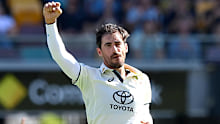 BRISBANE, AUSTRALIA - JANUARY 25: Mitchell Starc of Australia celebrates taking the wicket of Alick Athanaze of the West Indies during day one of the Second Test match in the series between Australia and West Indies at The Gabba on January 25, 2024 in Brisbane, Australia. (Photo by Bradley Kanaris/Getty Images)