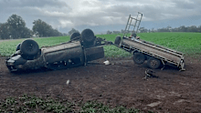Darcy Clode was pelted by rocks and debris and his ute flipped onto its roof. His dog was inside but thankfully OK.