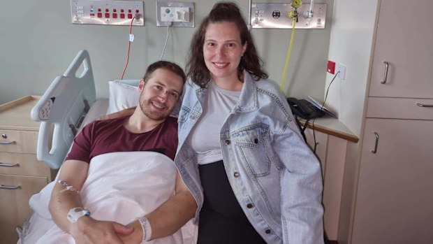 Constable Randall Kirk and his wife in hospital after the Wiemballa shooting.