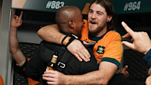 George Gregan hugs Fraser McReight.