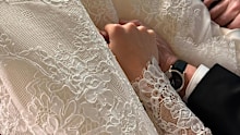 Gordon Ramsay holding Holly Ramsay's hand on her wedding day