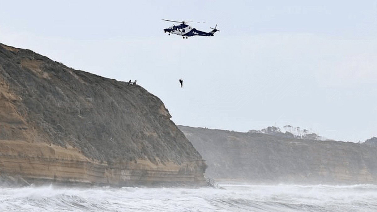 Surfer's dramatic helicopter rescue caught on camera | Nine.com.au