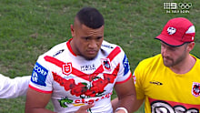 Moses Suli is assisted from the field after being knocked out against the Roosters.