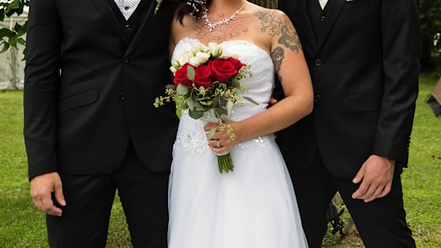 married couple with best man