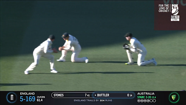 David Warner takes a catch to dismiss Jos Buttler.