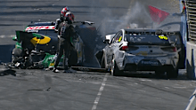 Nick Percat points at Macauley Jones' Holden Commodore as it begins to billow flames.