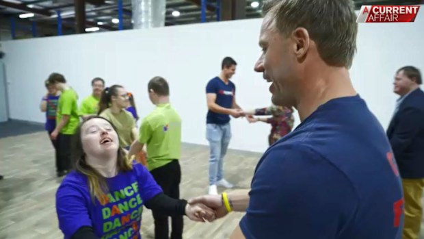Australian Firefighters Calendar donation to Down Syndrome South Australia