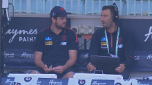 Angus Brayshaw is spotted on Melbourne's bench ahead of the Demons' match against the Western Bulldogs.