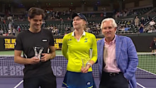 Elena Rybakina moves a tournament sponsor's hand away.