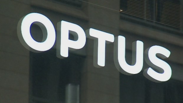 A close-up shot of an Optus store sign