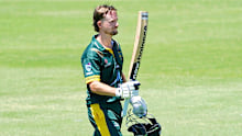 Austin Waugh celebrates a century for Randwick Petersham.