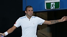 SYDNEY, AUSTRALIA - JANUARY 14: Daniel Evans of Great Britain reacts in his semi final match against Aslan Karatsev of Russia during day six of the Sydney Tennis Classic at the Sydney Olympic Park Tennis Centre on January 14, 2022 in Sydney, Australia. (Photo by Jason McCawley/Getty Images)