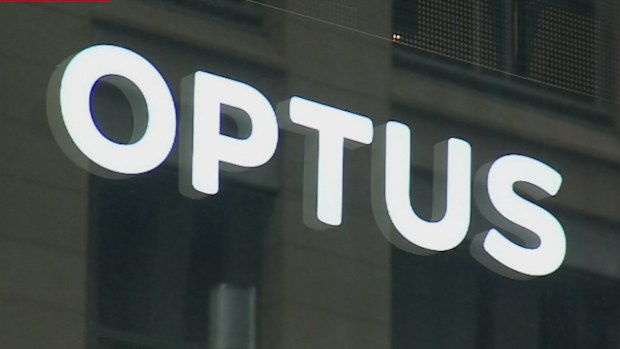 A close-up shot of an Optus store sign