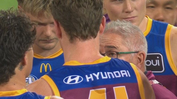 Brisbane coach Chris Fagan sprays his troops.