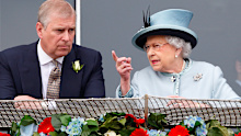 Prince Andrew, Duke of York and Queen Elizabeth II watch the racing as they attend Derby Day of the Investec Derby Festival at Epsom Racecourse on June 1, 2013 in Epsom, England.