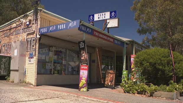 Hurstbridge: A milkbar worker has described the moment she jumped onto the back of an unknown man who shot paint at her in an attempted robbery in Melbourne's north-east. 