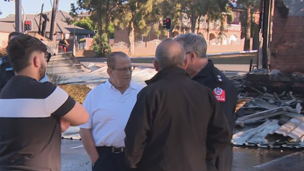 The owners of Savanas in Wetherill Park speaking to emergency services as they continue to investigate the cause of the blaze in Sydney's west.