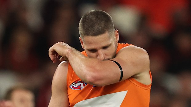Jesse Hogan kissed his black arm band as a tribute to McCarthy, who he played with at Fremantle.