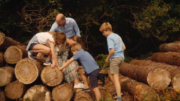 The Prince and Princess of Wales with their children in a family video