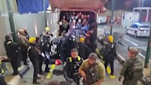 About 70 Palestinian men were found hiding in a garbage truck at a West Bank checkpoint.