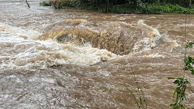 Car submerged by floodwaters on NSW Mid North Coast.