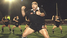 Norm Hewitt of New Zealand leads the haka before a match against Llanelli.