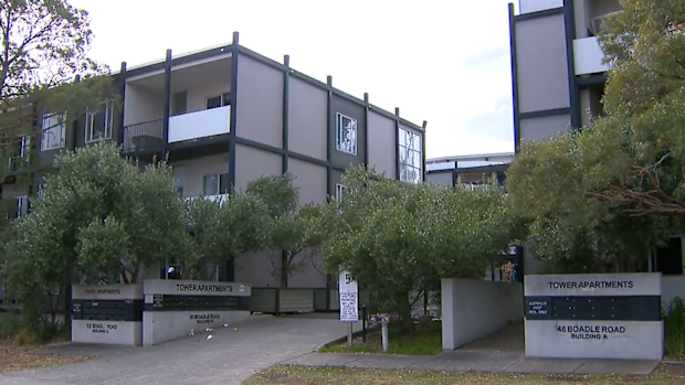 A man has been bitten by a police dog during an arrest, bringing a four-hour siege to an end in Melbourne's north-east.