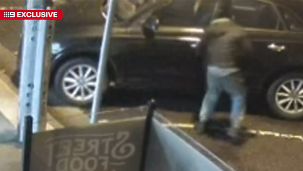 Two thieves drove off with the car, leaving the woman traumatised.