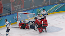 The brawl started when Canda's goalie was pushed into his own net.