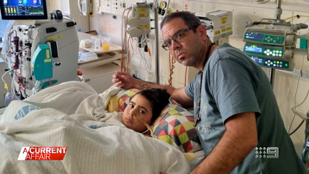 Nicholas and dad Simon Tadros pictured in hospital. 