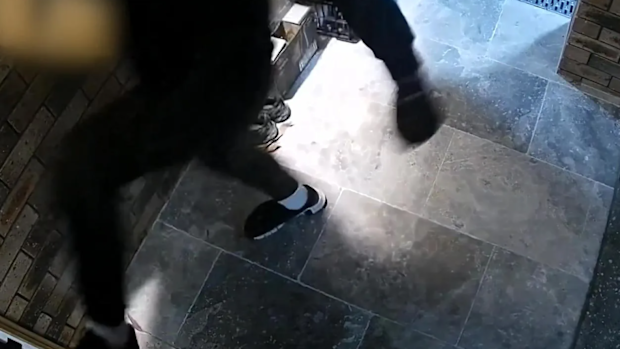 CCTV footage showed a man trying to kick down the door of the Edensor Park home