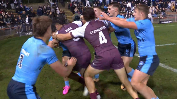 Blues and Maroons players clash at Leichhardt.