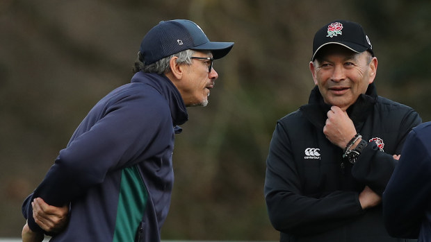 England coach Eddie Jones talks to London Irish coach Les Kiss in 2019.