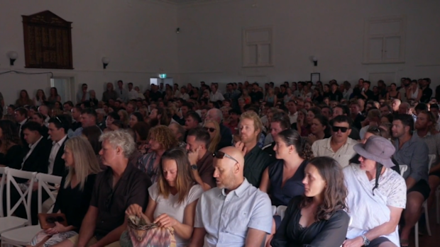 Mourners gather at a memorial service for Lance Appleby.