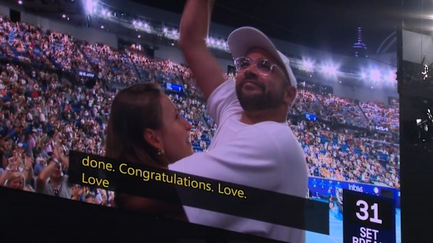 Love was in the air at Rod Laver Arena with a successful proposal in the stands.