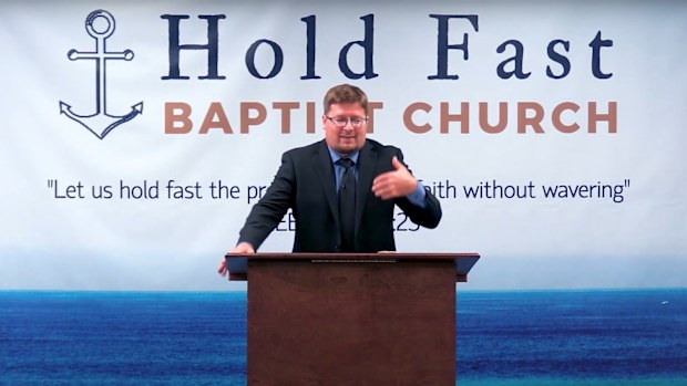 Pastor Jared Pozarnsky preaching a sermon.
