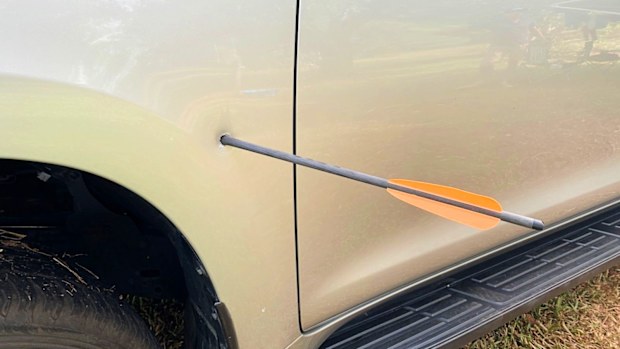 Northern Territory Police are investigating potential criminal damage charges after a car was impaled with a crossbow bolt south of Darwin. 