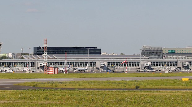 Terminals and a runway are seen at Chopin International Airport in July 2020 in Warsaw, Poland.
