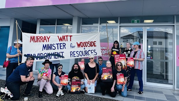 A Move Beyond Coal protest outside Renee Coffey's Griffith electoral office in Brisbane.