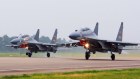 Chinese SU-30 fighter jets take off in 2017. China has been increasing its military capabilities.