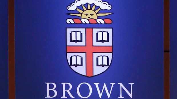 FILE - The logo for Brown University is displayed at the school's campus in Providence, R.I., on Wednesday, April 25, 2018. (AP Photo/Steven Senne, File)