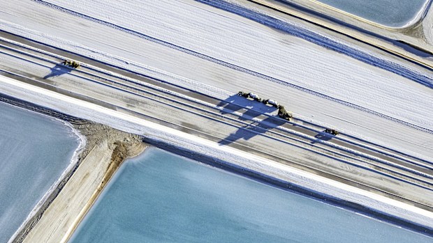 Aerial photo taken from a small plane showing a salt works and machinery at Useless Loop, Shark Bay, Western Australia