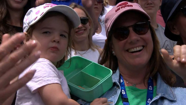 Sam Stosur's partner Liz Astling and their daughter Evie in the crowd.