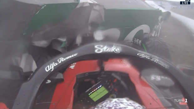 A crash for Zhou Guanyu in the heavy rain brought about a late-race red flag.